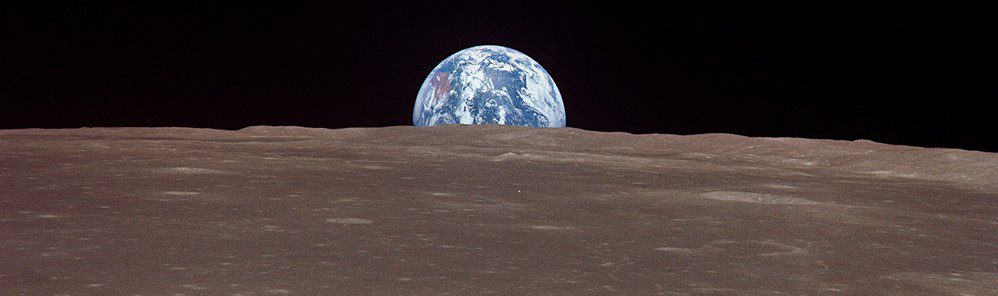 Earthrise seen from the lunar surface, Earth rising over the Moon's horizon