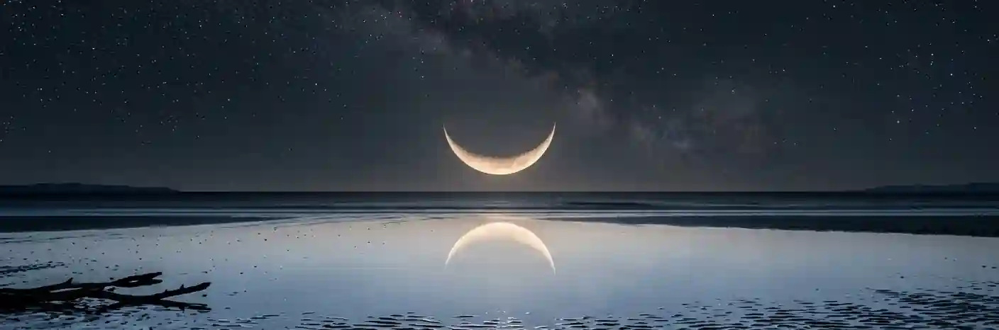 A wet Moon appearing as a bowl-shaped crescent above the horizon
